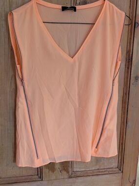 One Step Ahead Peach Sleeveless V-Neck Top with Silver Zipper Detailing